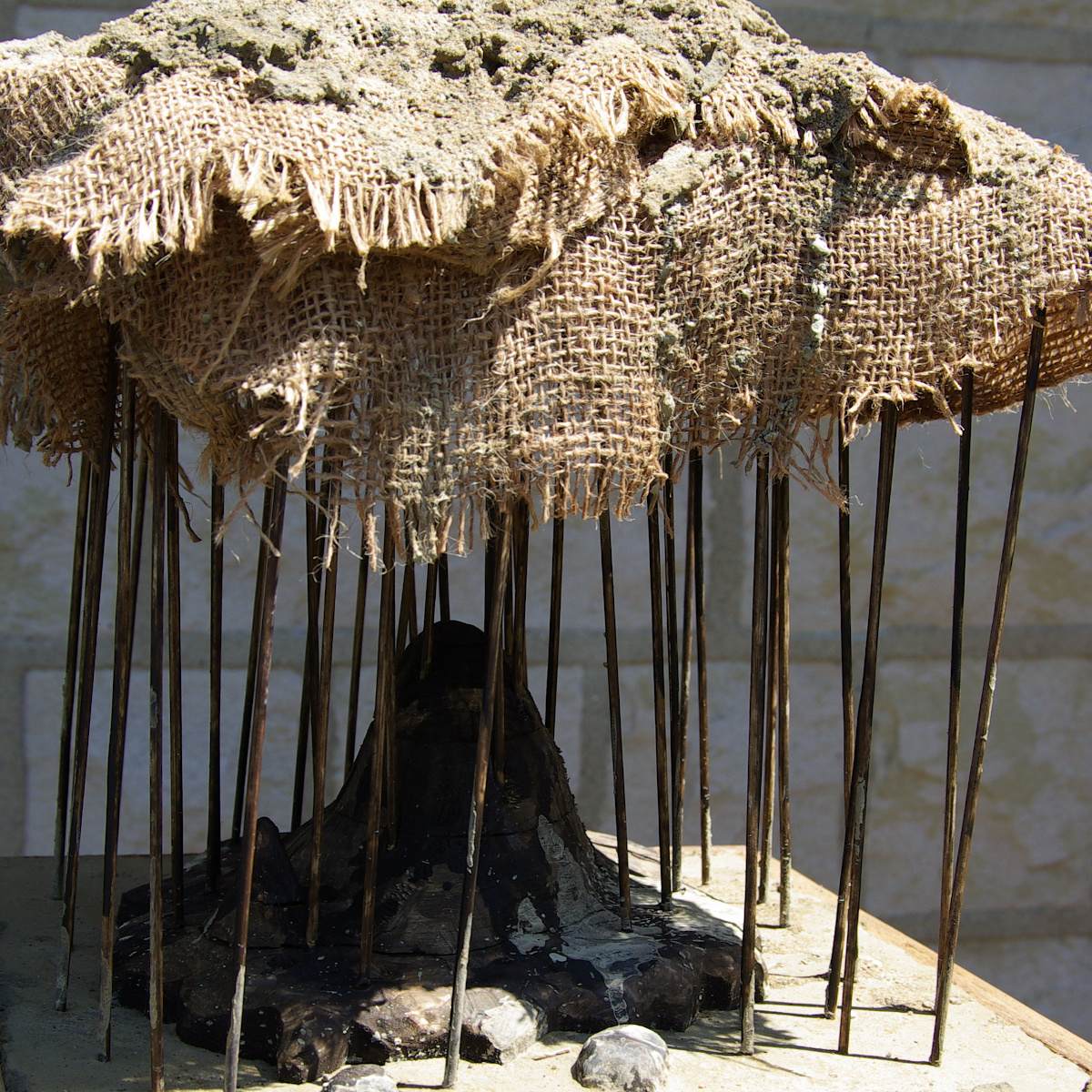Atmosphere (The Thing I Can't Name), 2026, Mixed Media (Wood, Cement, and Sackcloth), ~12 by 12 by 12 Inches.